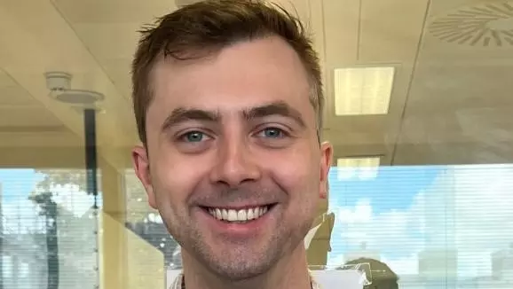 Portrait photo of Greg